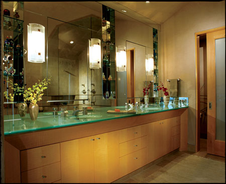 
Six-inch-deep medicine cabinets and English sycamore cabinetry were integrated into this stunning bathroom remodel.
